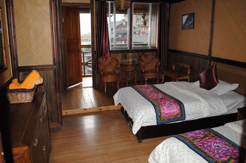 familiekamer in Ping'an guesthouse met tussendeur - Ping an Guesthouse - China
