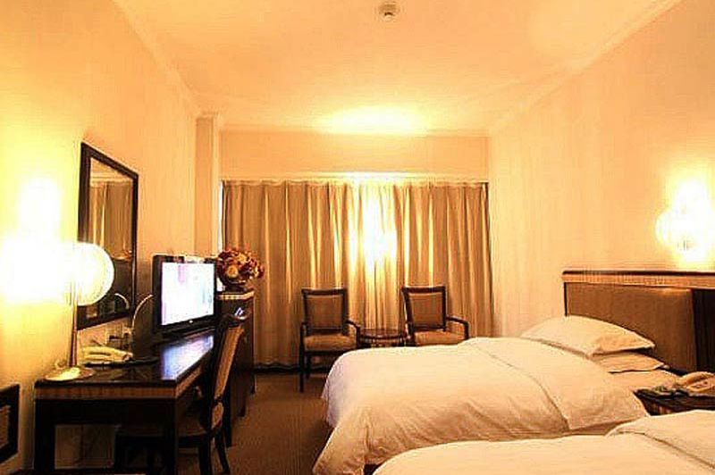 standaardkamer van Luoyang Peony Hotel in Luoyang - Luoyang Peony Hotel - China - foto: Luoyang Peony Hotel